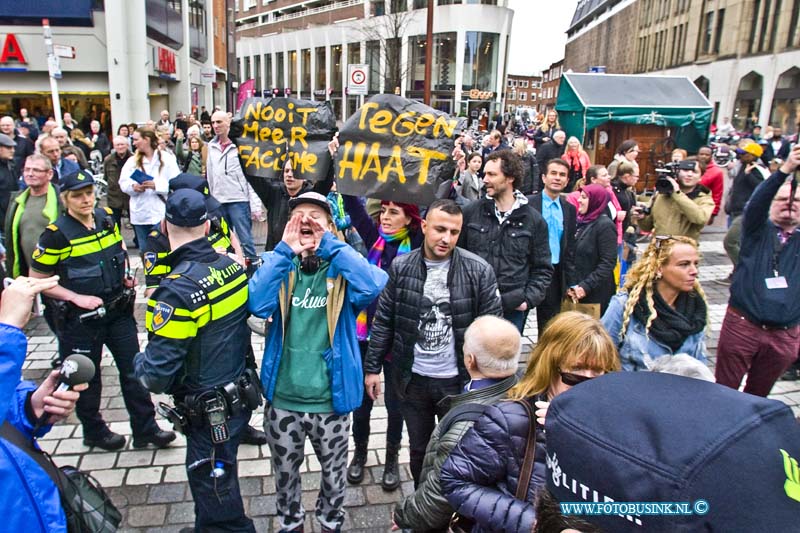 16040210.jpg - DORDRECHT 02 April 2016 Bezoek Wilders aan Dordtse markt vol geweld. Tijdens het bezoek van Wilders aan de Dordtse weekendmarkt om te flyeren voor de campagne tegen het akkoord tussen de EU en Oekraïne van 6 april , waren veel protesten en demonstranten, die tegen haat en geweld zijn, ondanks werden er enkelen arrestaties verricht met geweld door de politie. Ook waren er tal van anti Wilders spandoeken en vele anti-Wilder stickers geplakt. Het was lang onrustig en ook werd er tot ver na het bezoek mensen gefouilleerd.Deze digitale foto blijft eigendom van FOTOPERSBURO BUSINK. Wij hanteren de voorwaarden van het N.V.F. en N.V.J. Gebruik van deze foto impliceert dat u bekend bent  en akkoord gaat met deze voorwaarden bij publicatie.EB/ETIENNE BUSINK