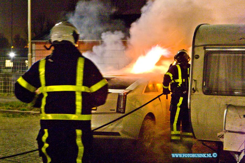 16032504.jpg - DORDRECHT 25 Maart 2016 Bij een auto brand in de Zeehavenlaan hedenavond is een auto uitgebrand. De brandweer bluste de auto ook de naast gelegen caravan liep schade op. De politie gaat een onderzoek instellen naar de brand.Deze digitale foto blijft eigendom van FOTOPERSBURO BUSINK. Wij hanteren de voorwaarden van het N.V.F. en N.V.J. Gebruik van deze foto impliceert dat u bekend bent  en akkoord gaat met deze voorwaarden bij publicatie.EB/ETIENNE BUSINK